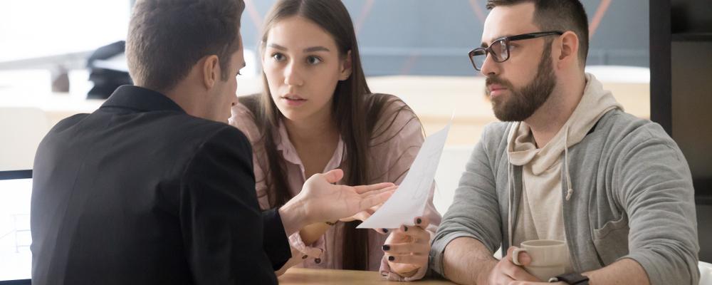 Family having an inheritance dispute in attorney's office